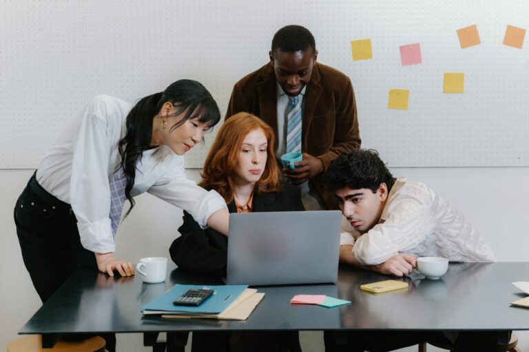 Higher education colleagues collaborating to solve problems and build collective agency ThenSomehow.